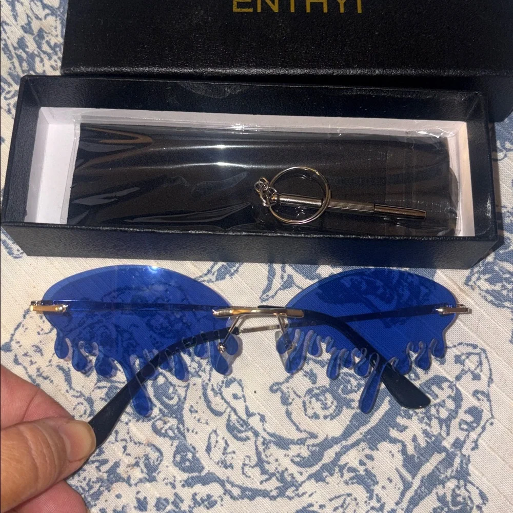 New in box teardrop blue sunglasses